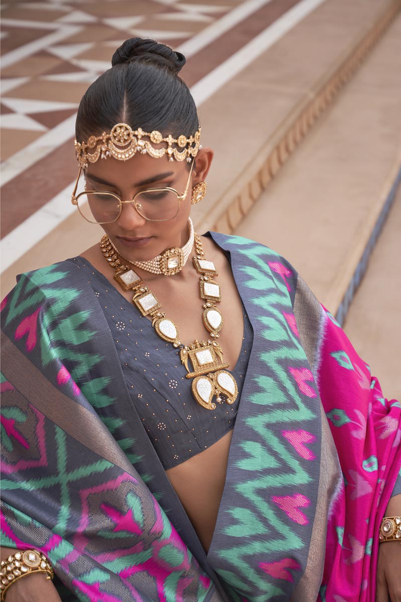 Art Silk Fabric Rani Color Patola Saree With Winsome Printed Work