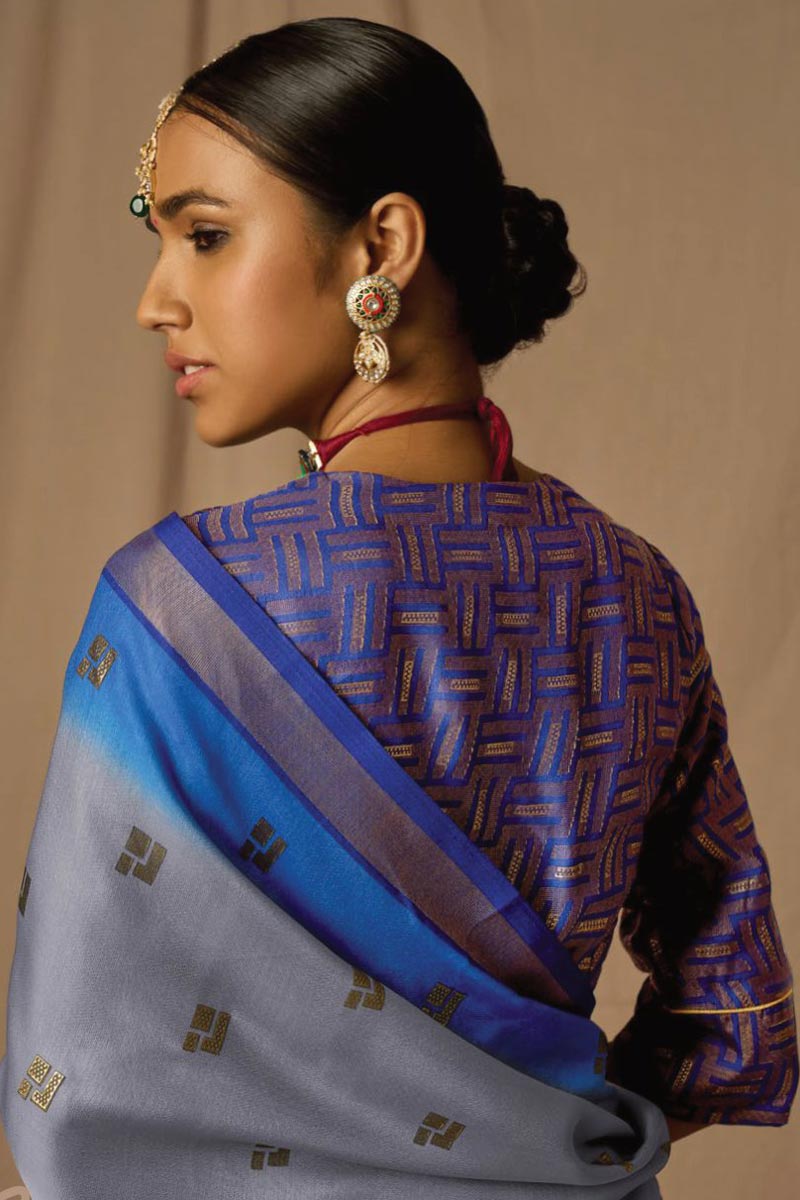 Trendy Brasso Fabric Blue Saree With Weaving Work