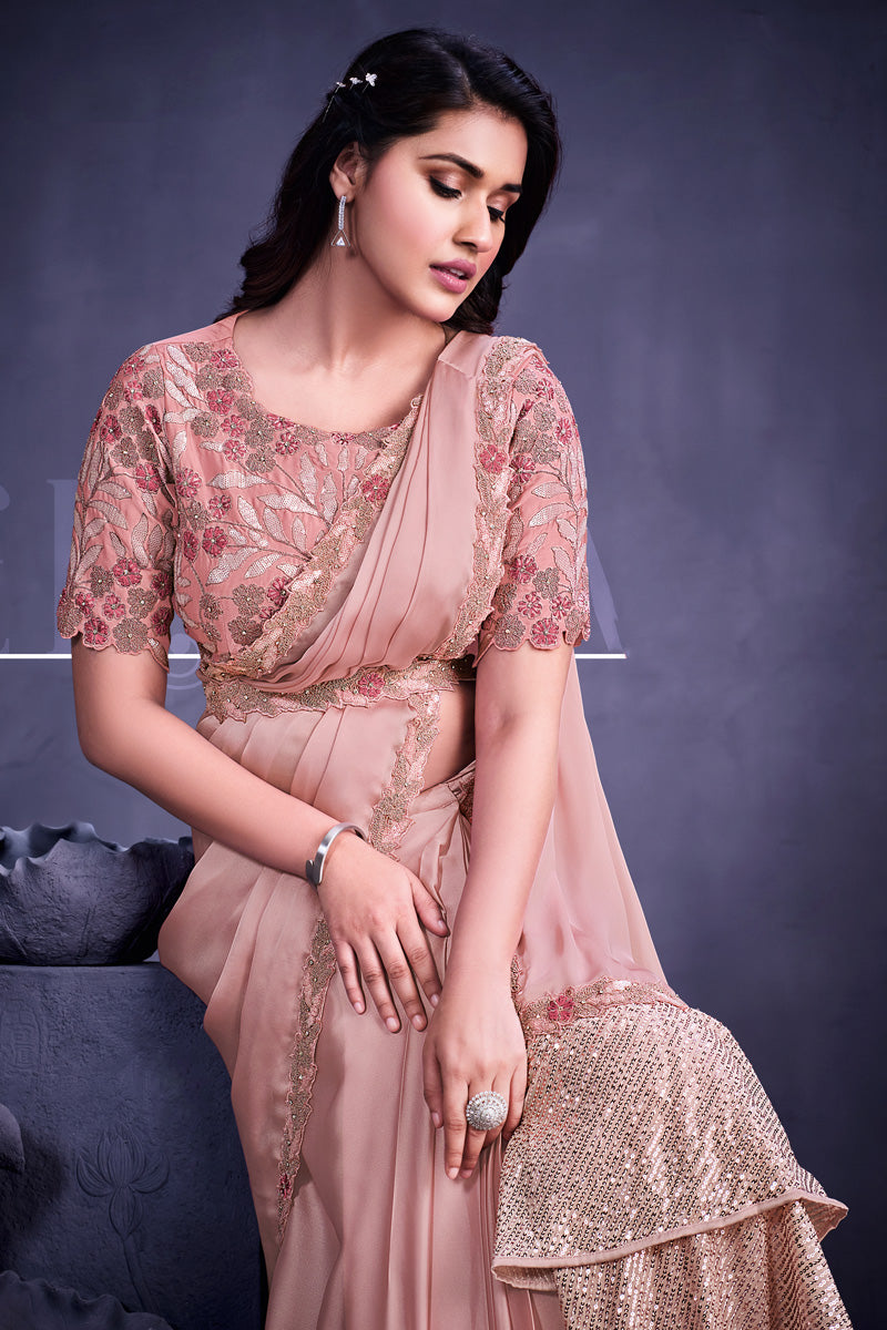 Georgette Fabric Peach Color Saree With Fascinating Border Work