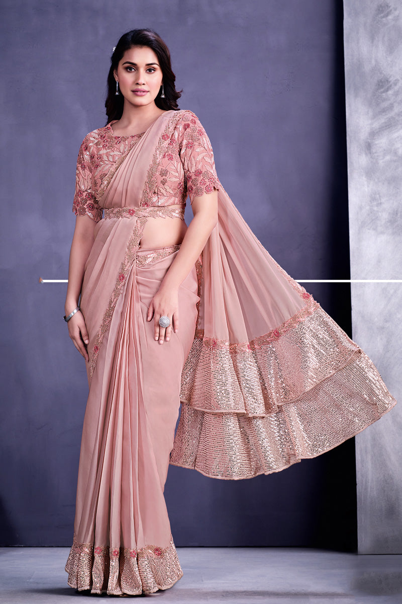 Georgette Fabric Peach Color Saree With Fascinating Border Work