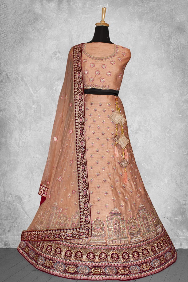 Mesmeric Peach Color Embroidered Work On Lehenga In Art Silk Fabric