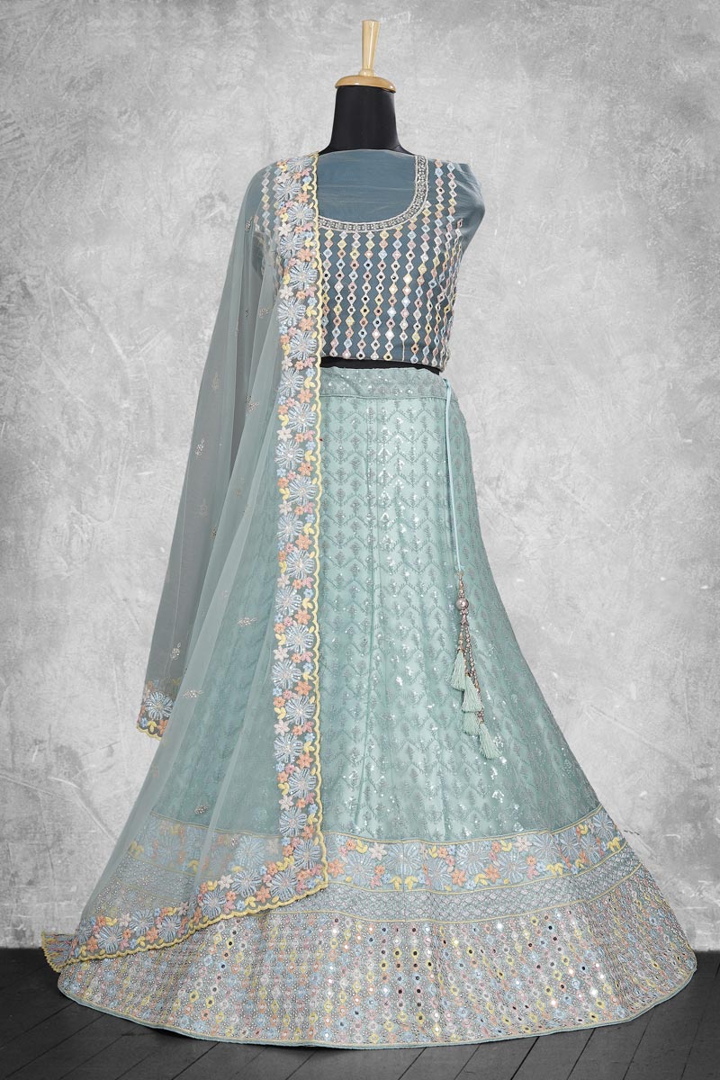 Creative Embroidered Work On Lehenga In Light Cyan Color Net Fabric