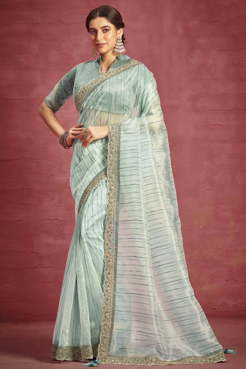Creative Border Work On Sea Green Color Organza Fabric Saree